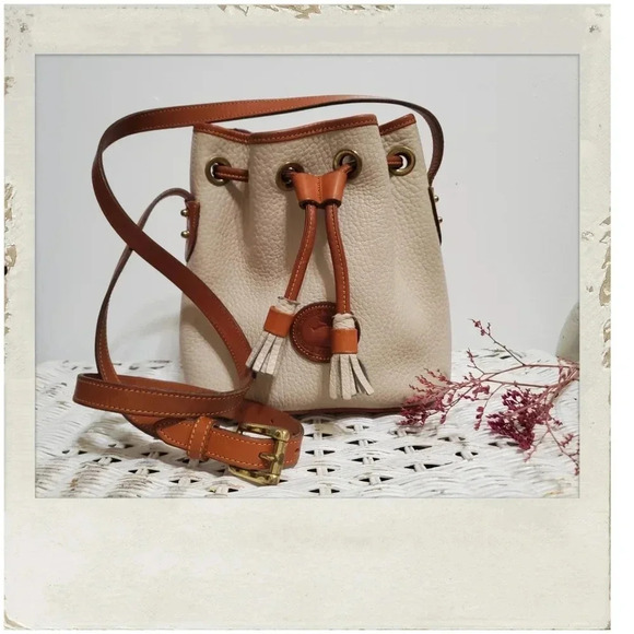 Dooney Bourke | Vintage Tan Bone Mini Drawstring Bucket Crossbody Bag - Picture 1 of 5